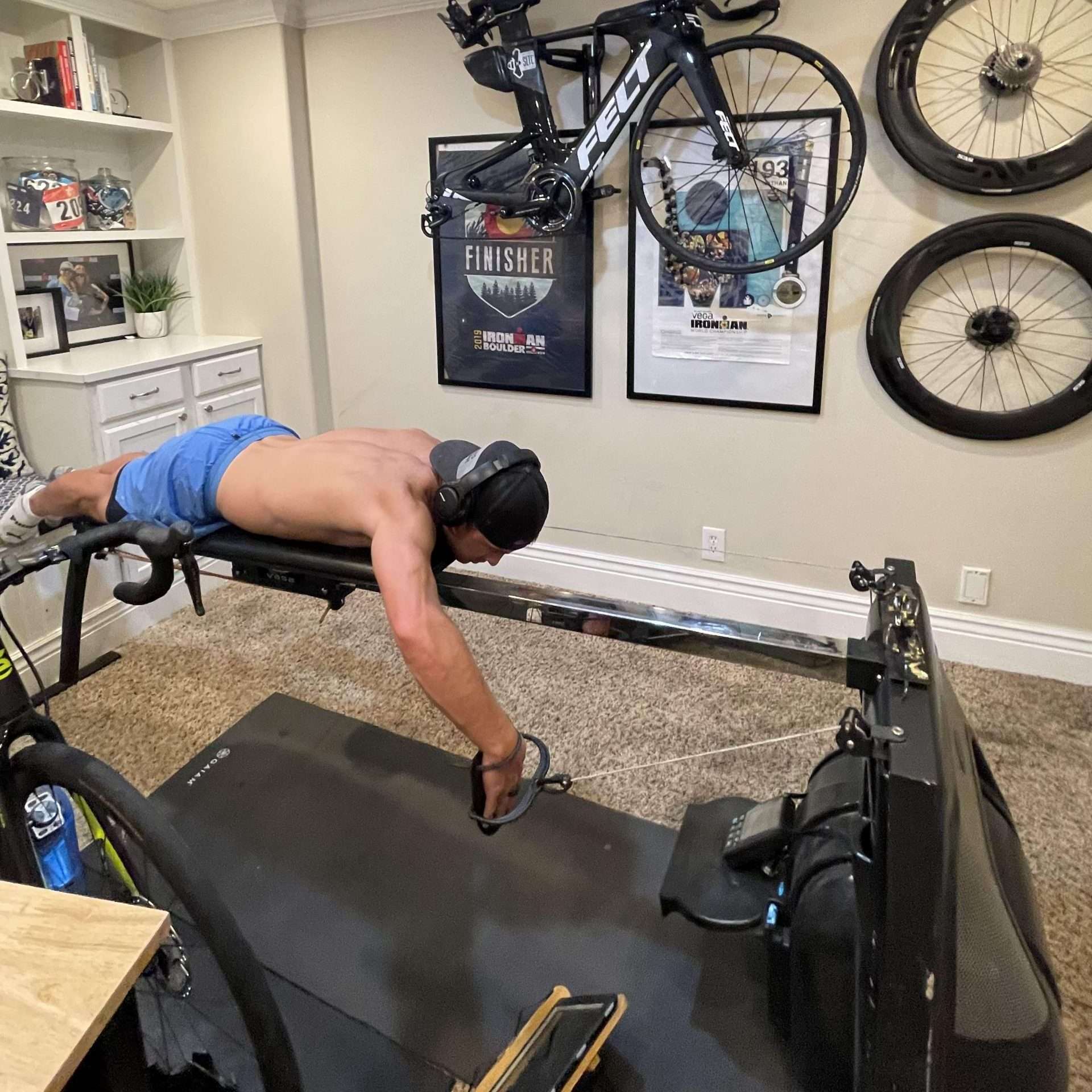 ironman triathlete tracks his swim training at home with the power meter connected to Trainer Road